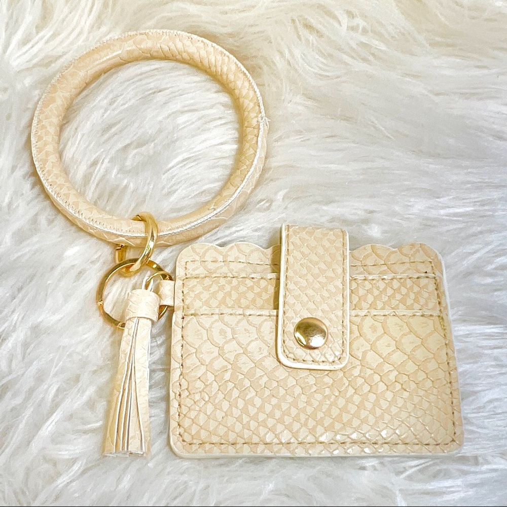 Altr'd State Wristlet Cream Alligator Print Round Handle & Tassel